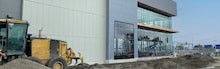 Construction of a multi-story building enclosure in progress