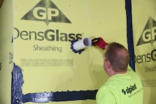 Worker sealing pipe joint