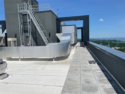 Parapets are a critical interface where building aesthetics meet performance.