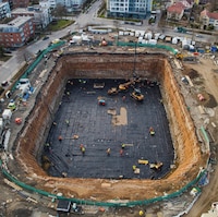 Construction site for new building using pre-applied waterproofing membrane material from Siplast.