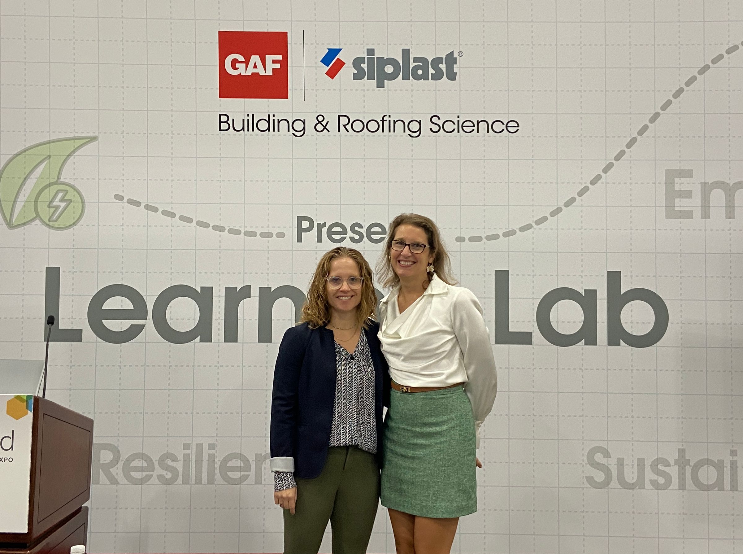 a3823e9c-f258-455d-9609-aea12356bb21 Andrea with colleague Jennifer at a Learning Lab session during the Greenbuild conference.