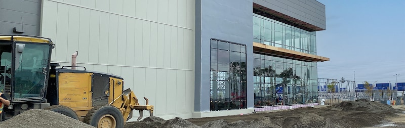 Construction of a multi-story building enclosure in progress